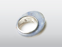 Load image into Gallery viewer, Sterling Silver Ring encircling blue Corian

