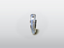 Load image into Gallery viewer, Sterling Silver Ring encircling blue Corian
